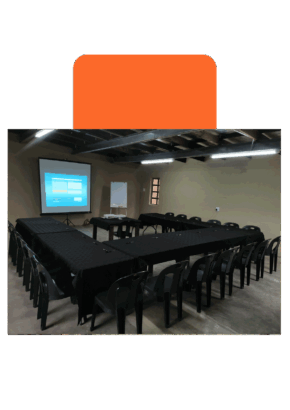 Our conference facilities with a projector, whiteboard, tables and chairs.